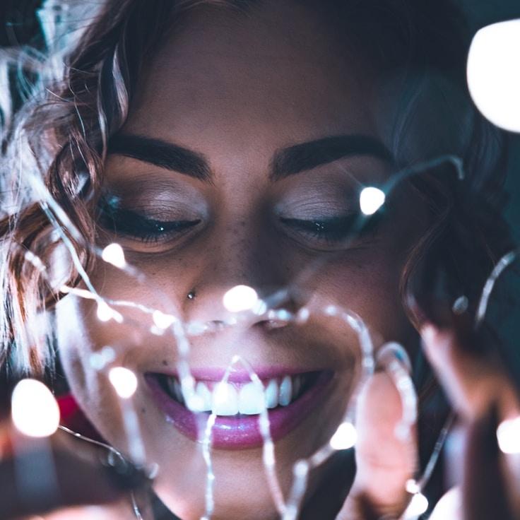 Alex Rivera, Lead Design Curator at Forest Grain Home, reviewing corporate floral arrangements